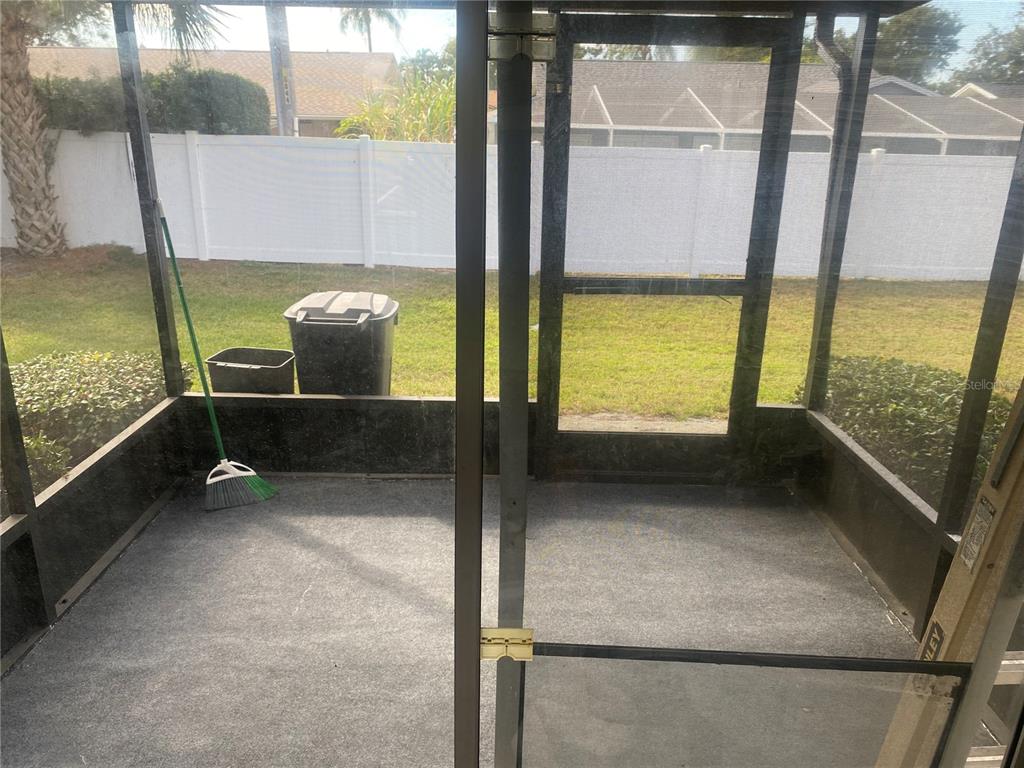 2472 Enterprise Road, Unit 6 Clearwater, FL 33763 - Photo 22 of 22 a view of an empty room with a window