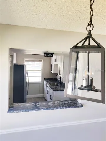 a view of a living room and a window