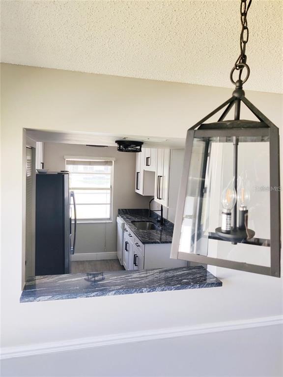 2472 Enterprise Road, Unit 6 Clearwater, FL 33763 - Photo 7 of 22 a view of a living room and a window