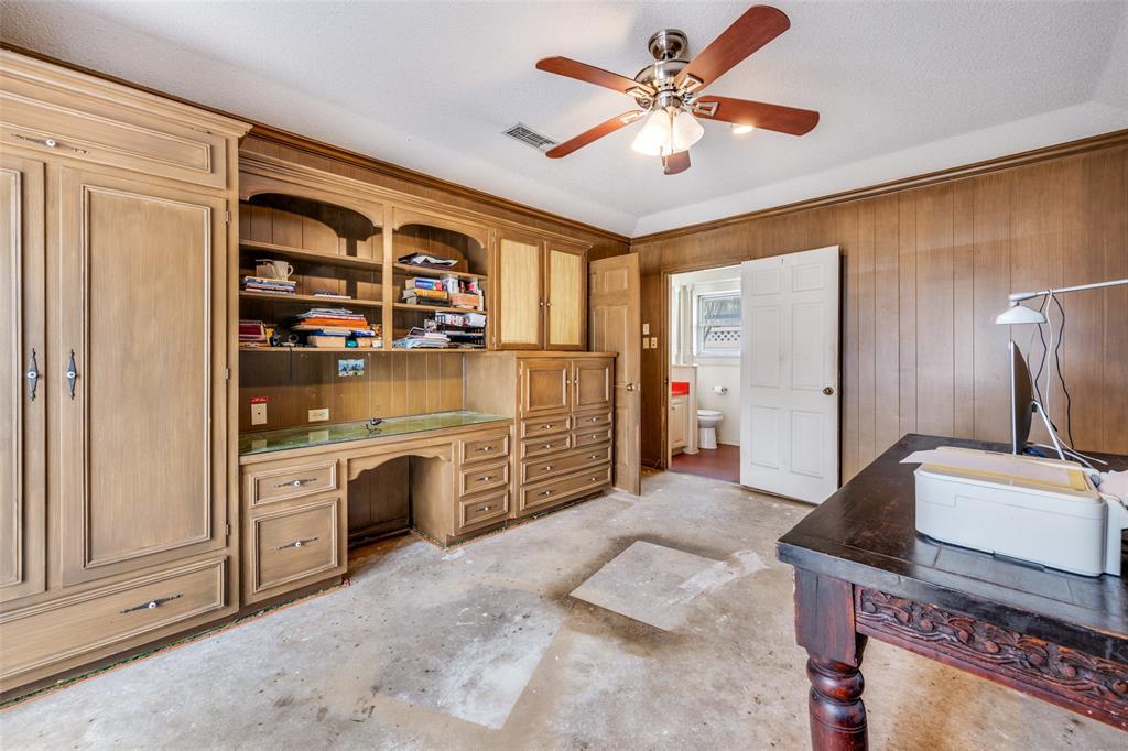 5001 Boulder Lake Road Fort Worth, TX 76103 - Photo 12 of 22 a kitchen with stainless steel appliances granite countertop a stove a sink and a refrigerator