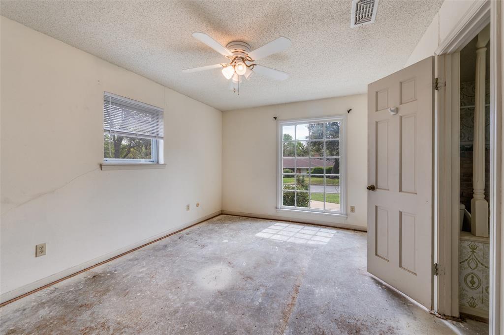 5001 Boulder Lake Road Fort Worth, TX 76103 - Photo 14 of 22 a view of an empty room with a window