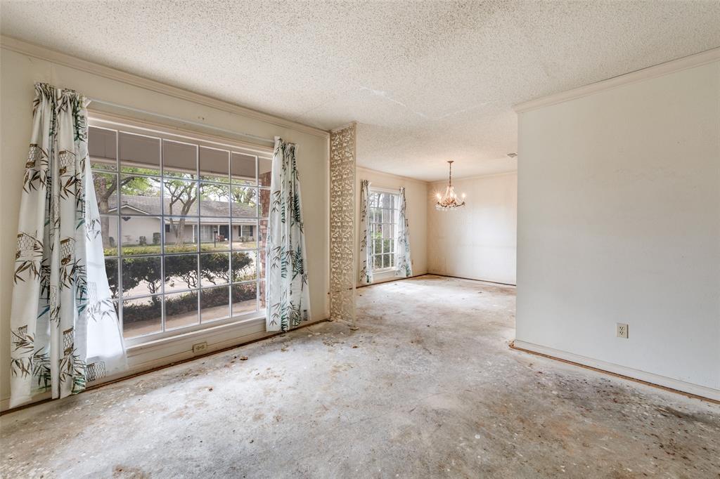 5001 Boulder Lake Road Fort Worth, TX 76103 - Photo 10 of 22 a view of a room with a large window