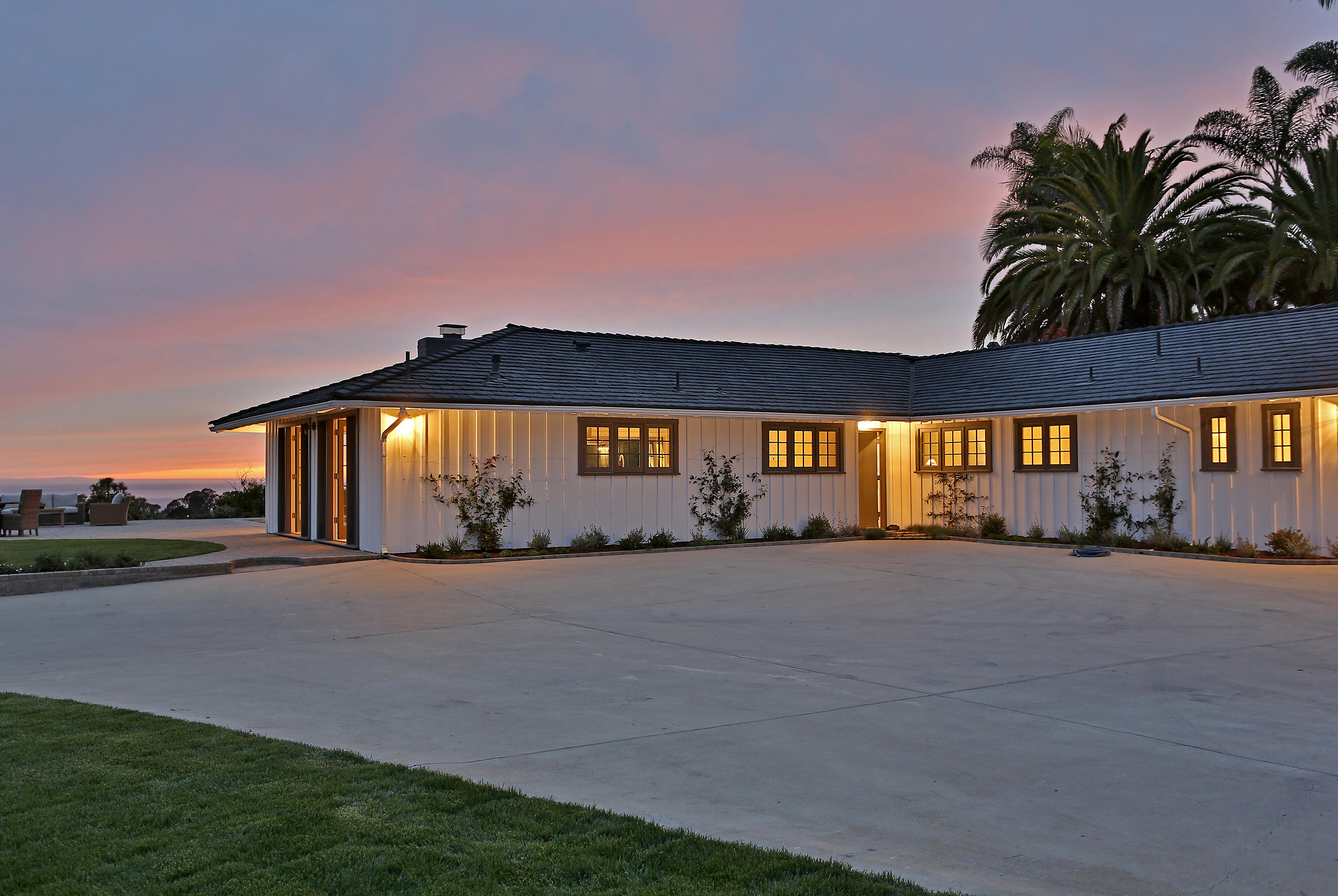 527 Meigs Road Santa Barbara, CA 93109 - Photo 21 of 30 a view of a house with a garage and a car parked