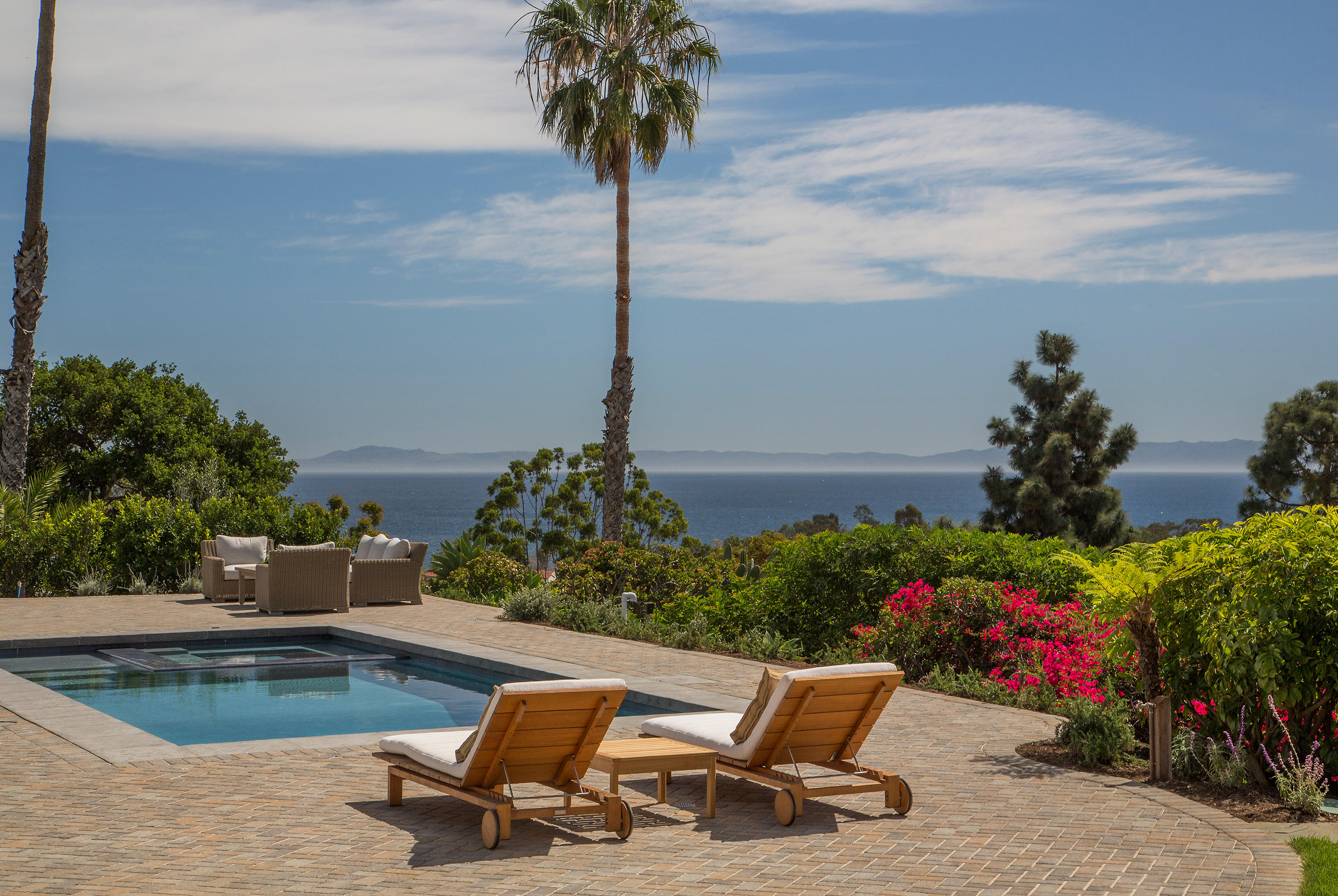 527 Meigs Road Santa Barbara, CA 93109 - Photo 29 of 30 a view of a lake with a bench in patio