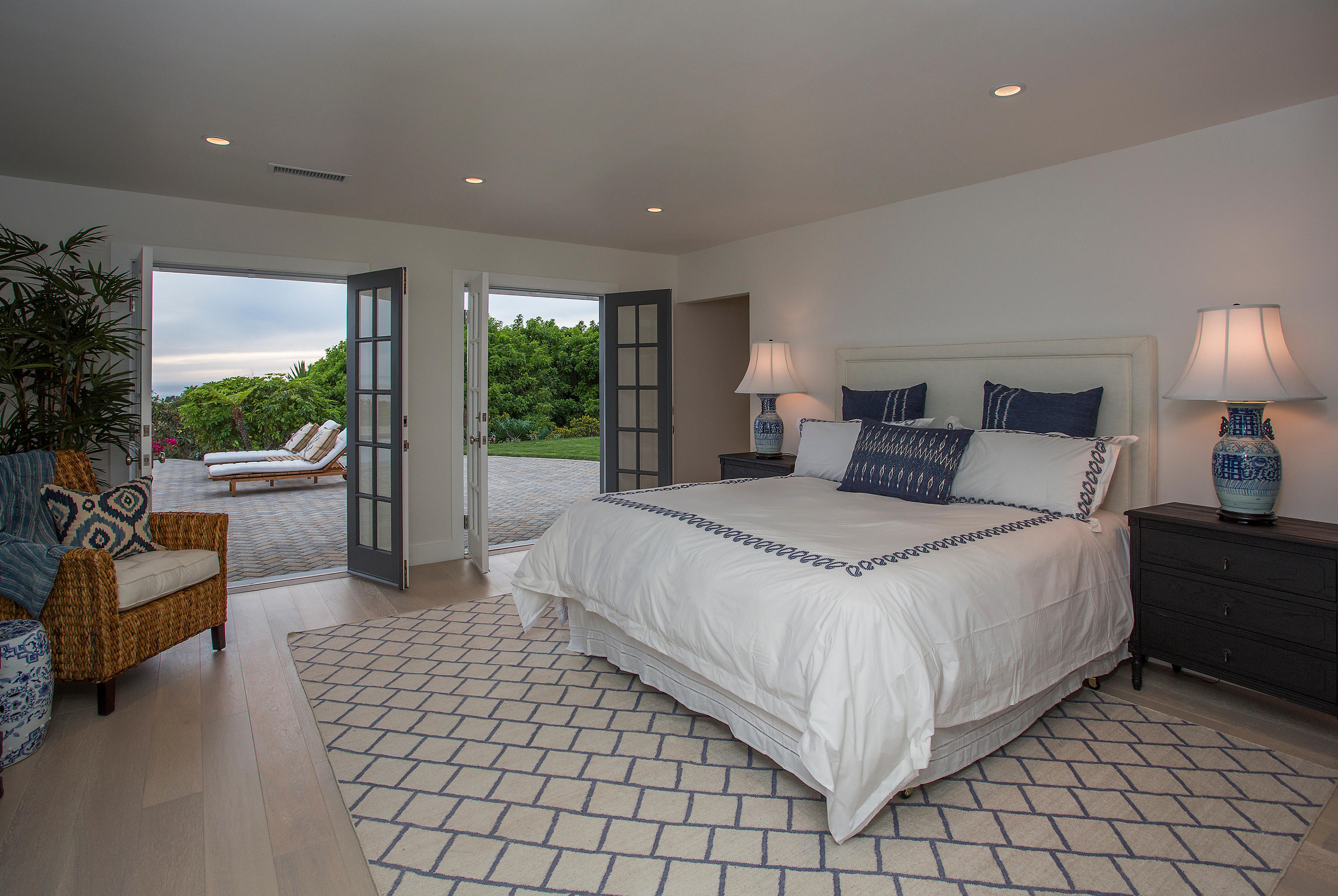 527 Meigs Road Santa Barbara, CA 93109 - Photo 8 of 30 a large bedroom with a bed and large window