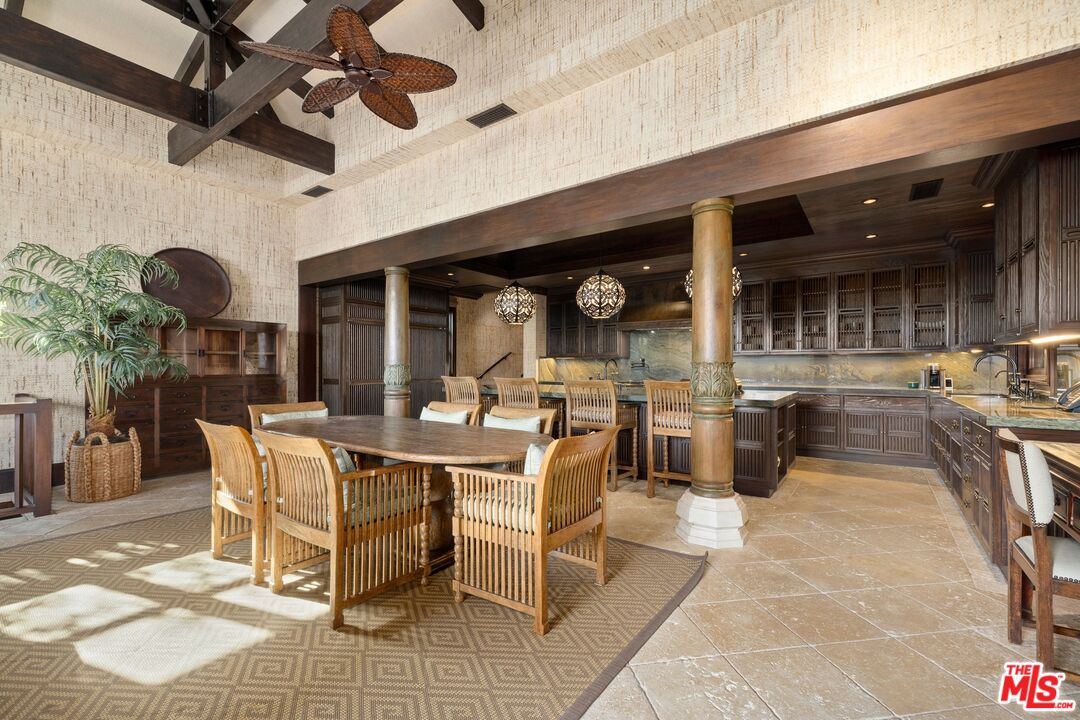 24834 Pacific Coast Highway Malibu, CA 90265 - Photo 19 of 50 a view of a patio with table and chairs