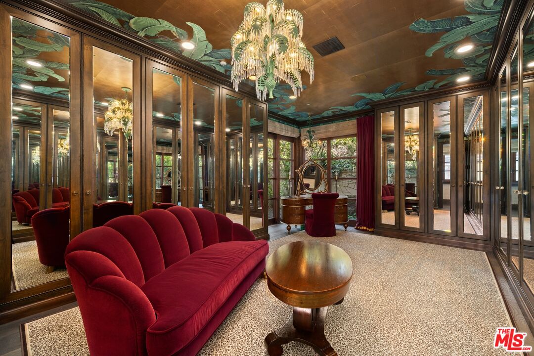24834 Pacific Coast Highway Malibu, CA 90265 - Photo 25 of 50 a living room with furniture and a large window