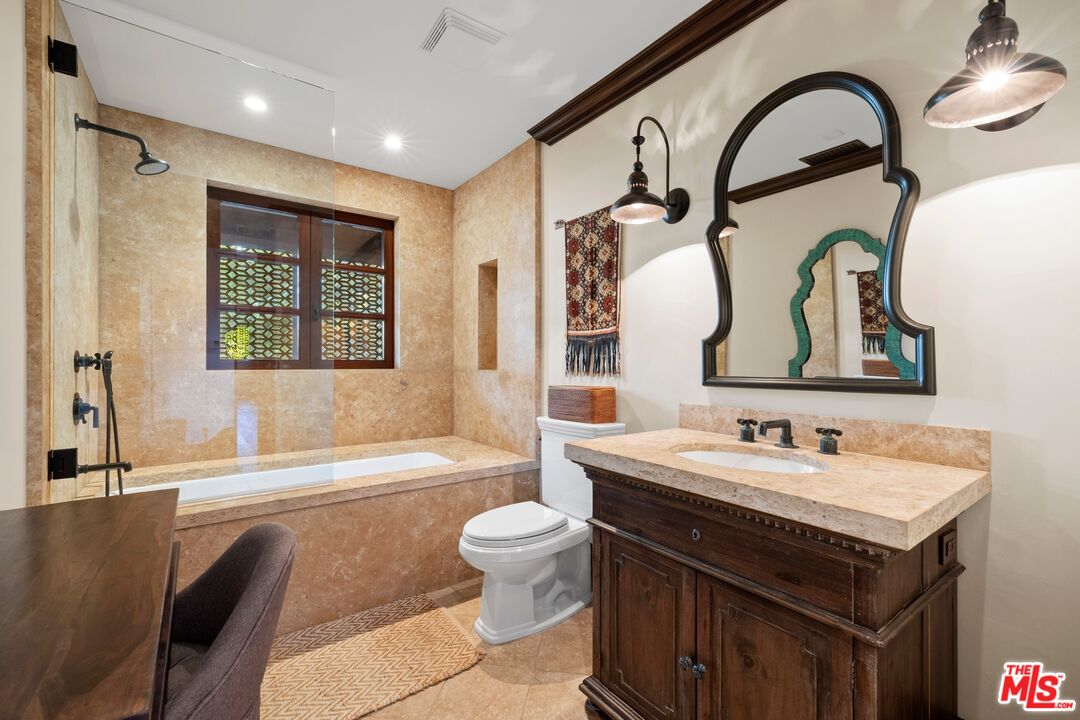 24834 Pacific Coast Highway Malibu, CA 90265 - Photo 48 of 50 a bathroom with a sink and a mirror