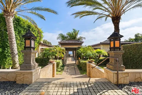 a living room with furniture fireplace and a flat screen tv