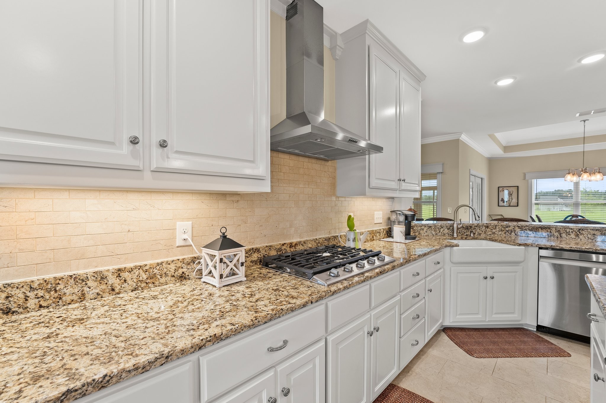 285 Hancock Lane Tullahoma, TN 37388 - Photo 19 of 79 a kitchen with granite countertop a sink a stove and cabinets