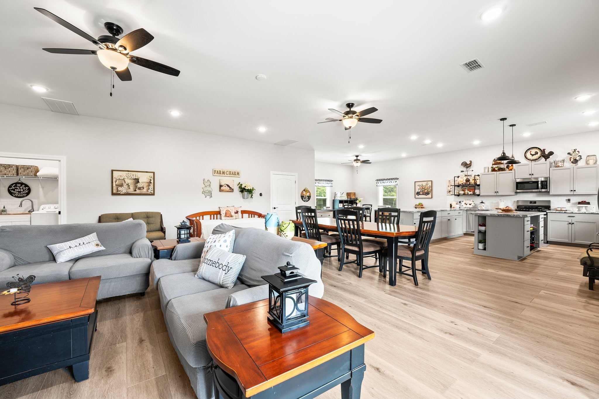 285 Hancock Lane Tullahoma, TN 37388 - Photo 47 of 79 a living room with furniture kitchen view and a chandelier