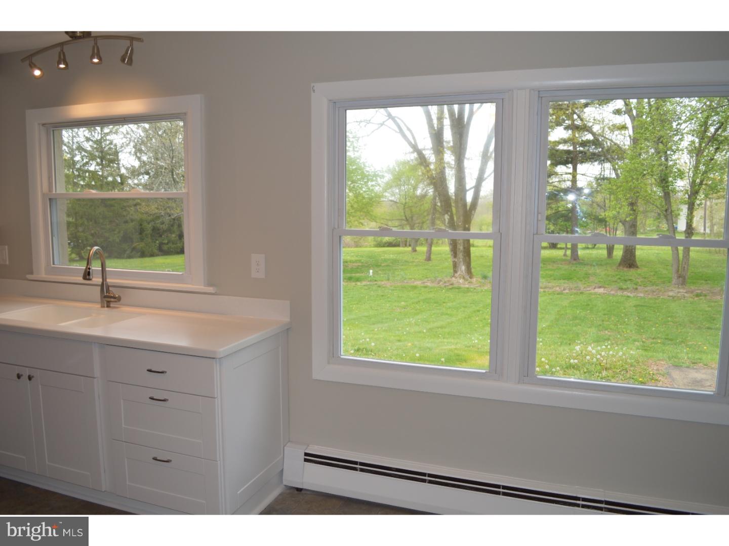 1112 Callowhill Road Perkasie, PA 18944 - Photo 10 of 17 a bathroom with a sink and a window