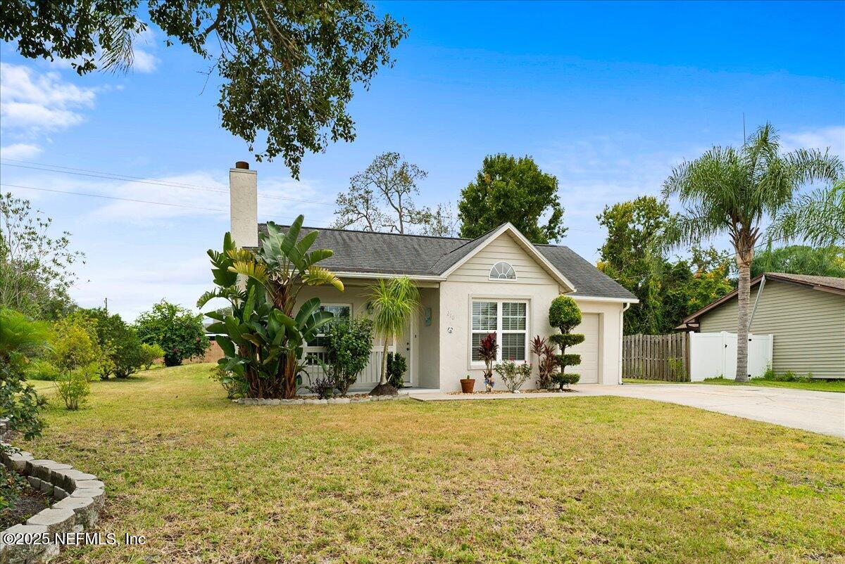 210 Dartmouth Road St. Augustine, FL 32086 - Photo 2 of 27 a view of a house with a yard