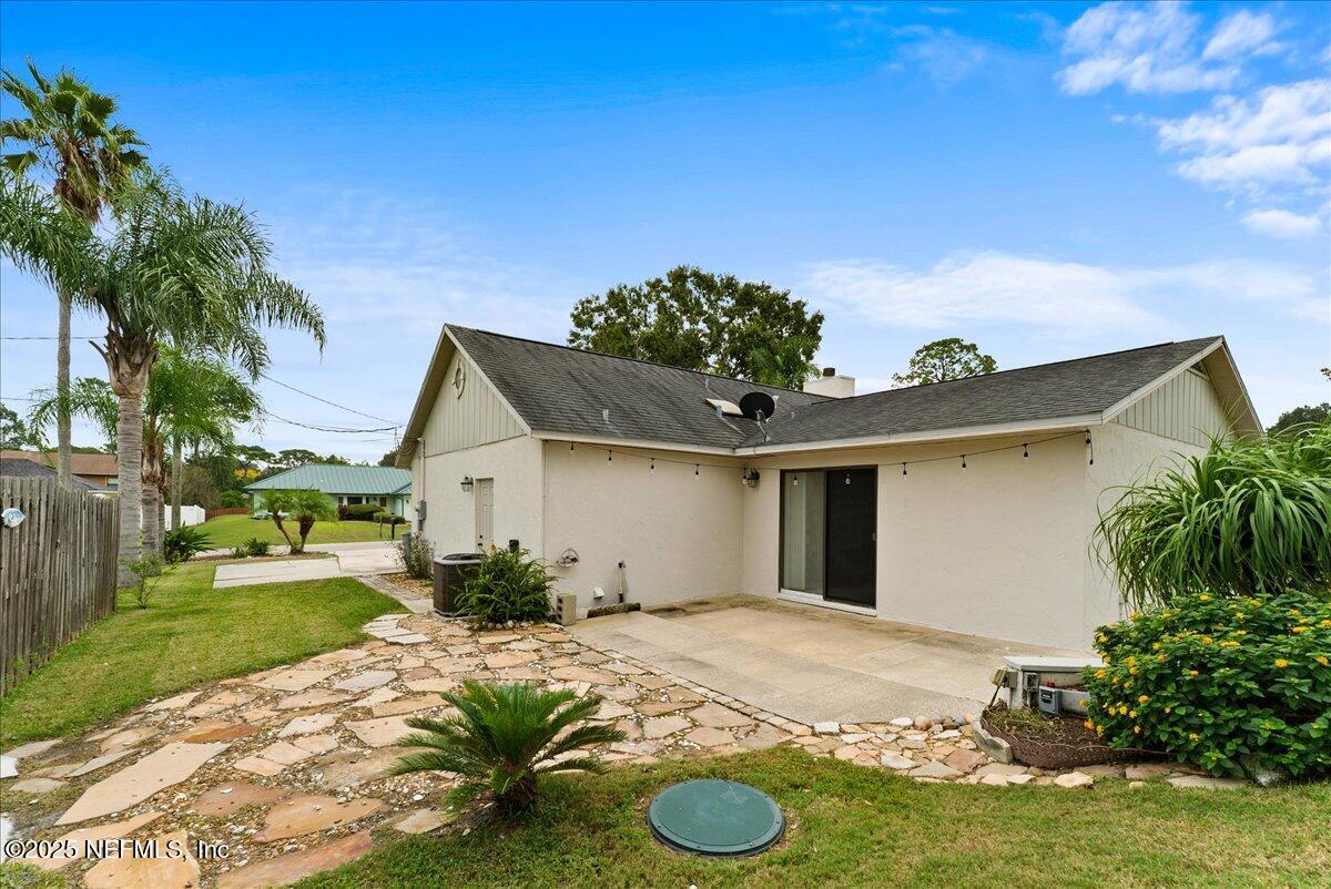 210 Dartmouth Road St. Augustine, FL 32086 - Photo 4 of 27 a view of a house with a yard