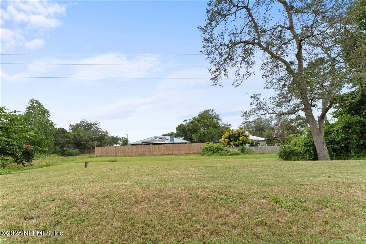 210 Dartmouth Road St. Augustine, FL 32086 - Photo 6 of 27 a view of a field with an trees