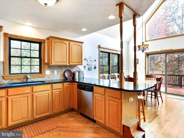 a view white cabinets and sink