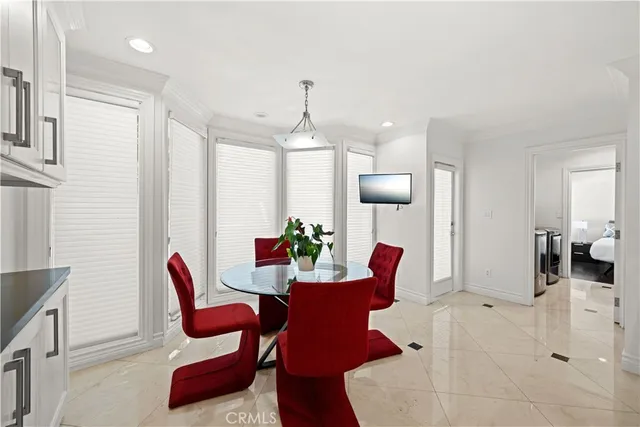 a bathroom with a granite countertop sink mirror vanity and toilet