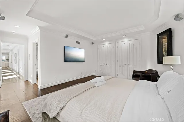 a view of a patio with couches table and chairs and potted plants