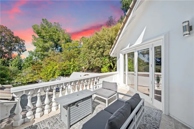 a house with trees in front of it