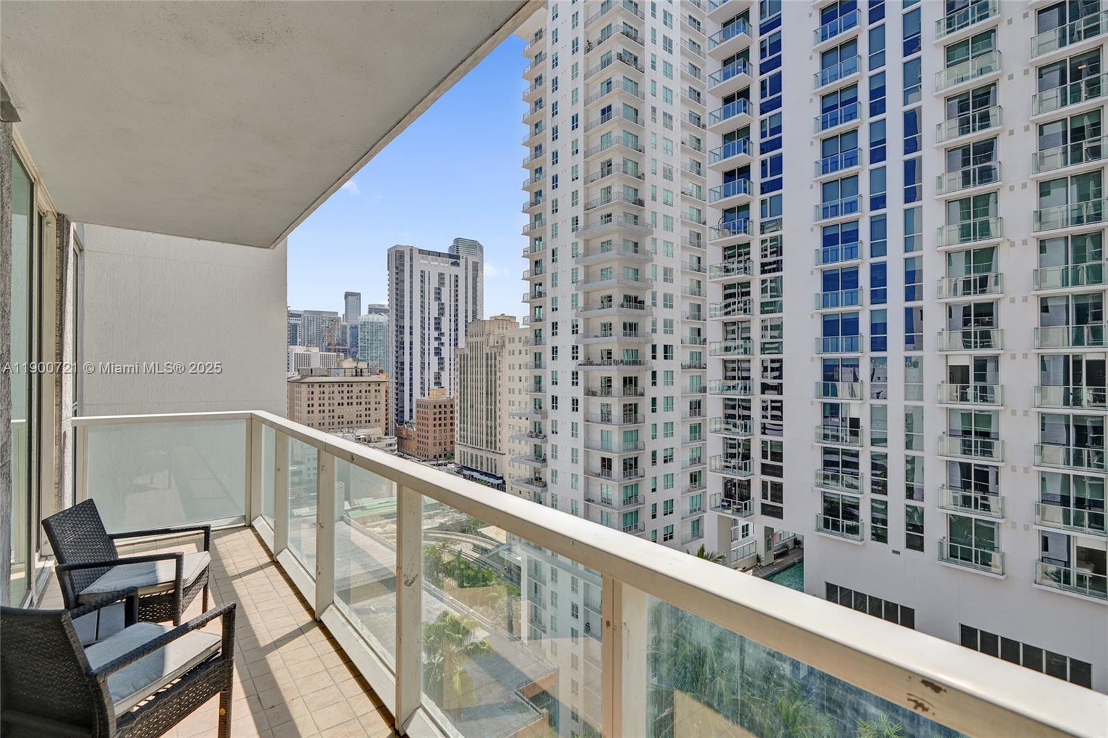 253 Northeast 2nd Street, Unit 1706 Miami, FL 33132 - Photo 25 of 32 a view of a balcony with wooden floor