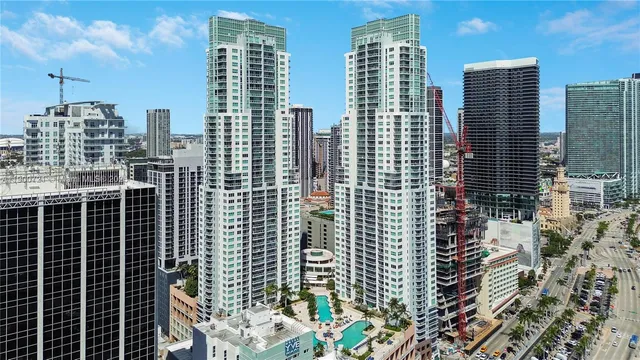 a view of a city with tall buildings