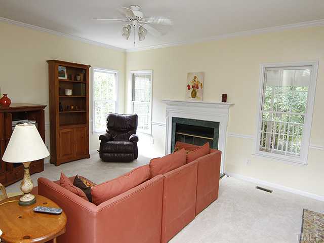 5404 Stewartby Drive Raleigh, NC 27613 - Photo 6 of 12 New Carpet, Fresh Paint, Ceiling Fan, Gas Log Fireplace, & Lots of Natural Sun Light. This is a happy space!