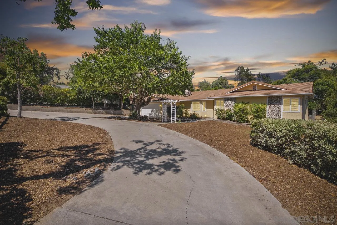 1369 Friends Way Fallbrook, CA 92028 - Photo 1 of 29 a view of a street with a building in the background