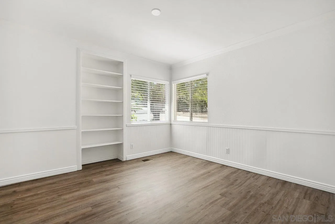 1369 Friends Way Fallbrook, CA 92028 - Photo 15 of 29 a view of a room with wooden floor and windows