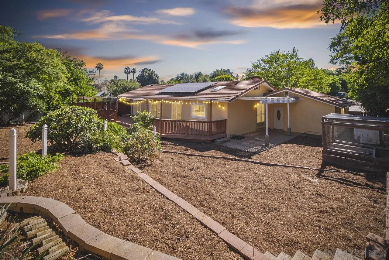 1369 Friends Way Fallbrook, CA 92028 - Photo 29 of 29 a view of a house with a yard and large tree