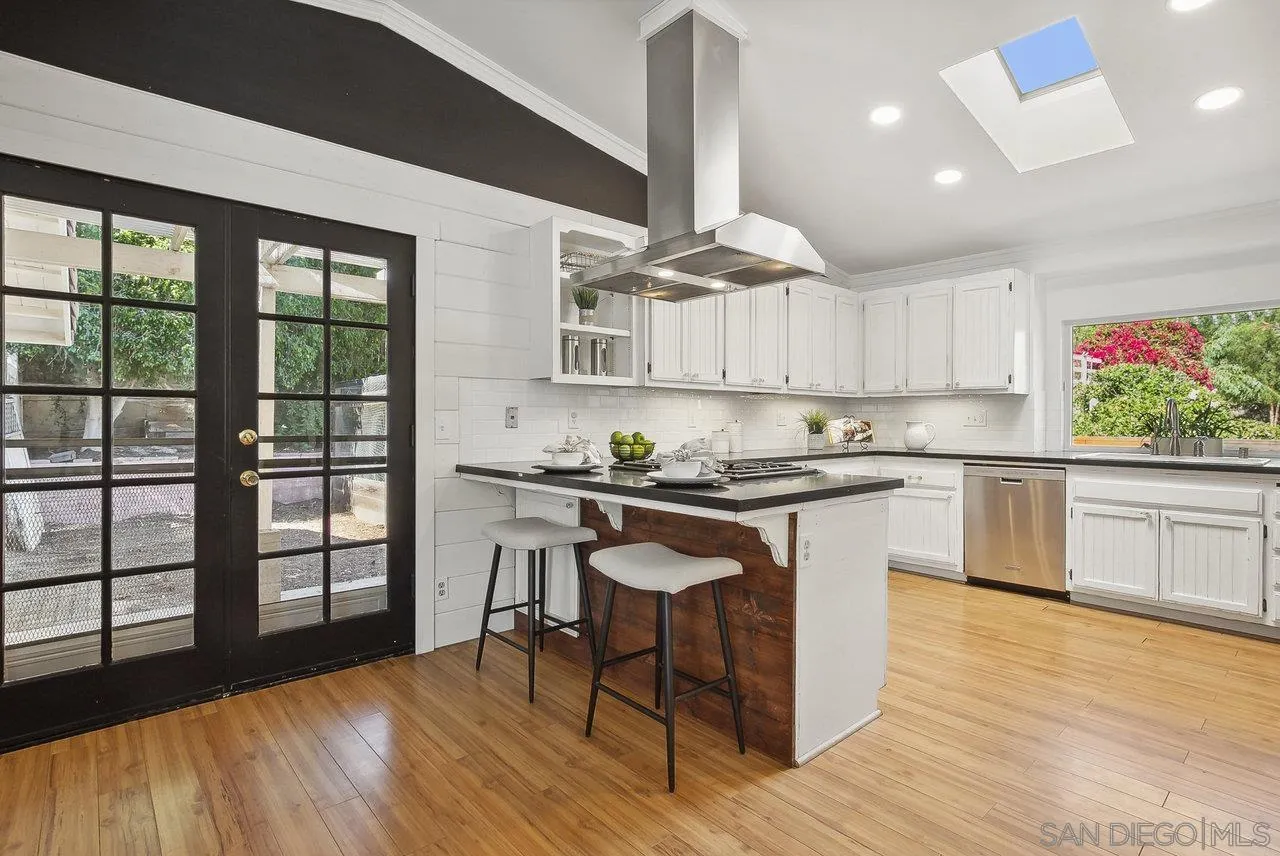 1369 Friends Way Fallbrook, CA 92028 - Photo 7 of 29 a kitchen with a sink cabinets and window
