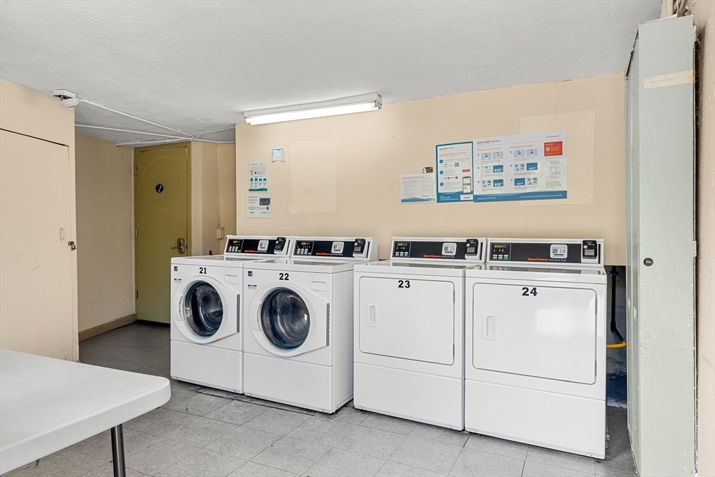 24 Westgate Road, Unit 2 Boston, MA 02467 - Photo 18 of 21 a utility room with dryer and washer