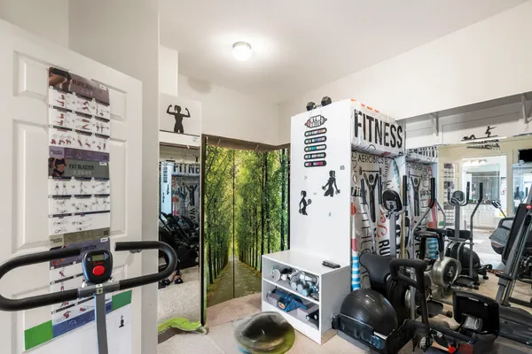 a view of a room with gym equipment