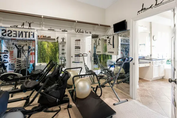 a bed room with a bed and a window