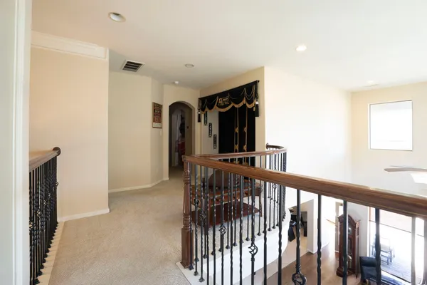 a patio with a table and chairs