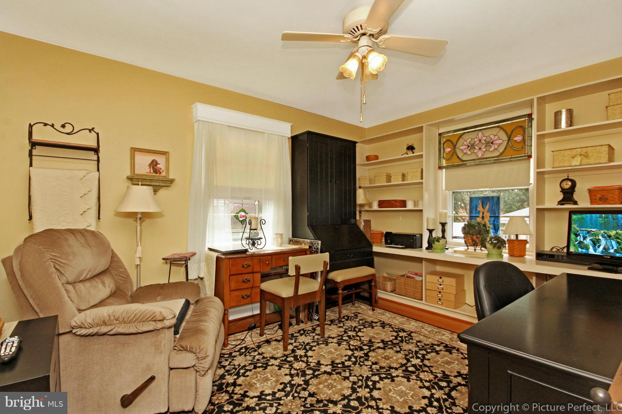 9210 Summit Road Silver Spring, MD 20910 - Photo 22 of 29 a living room with furniture and a window