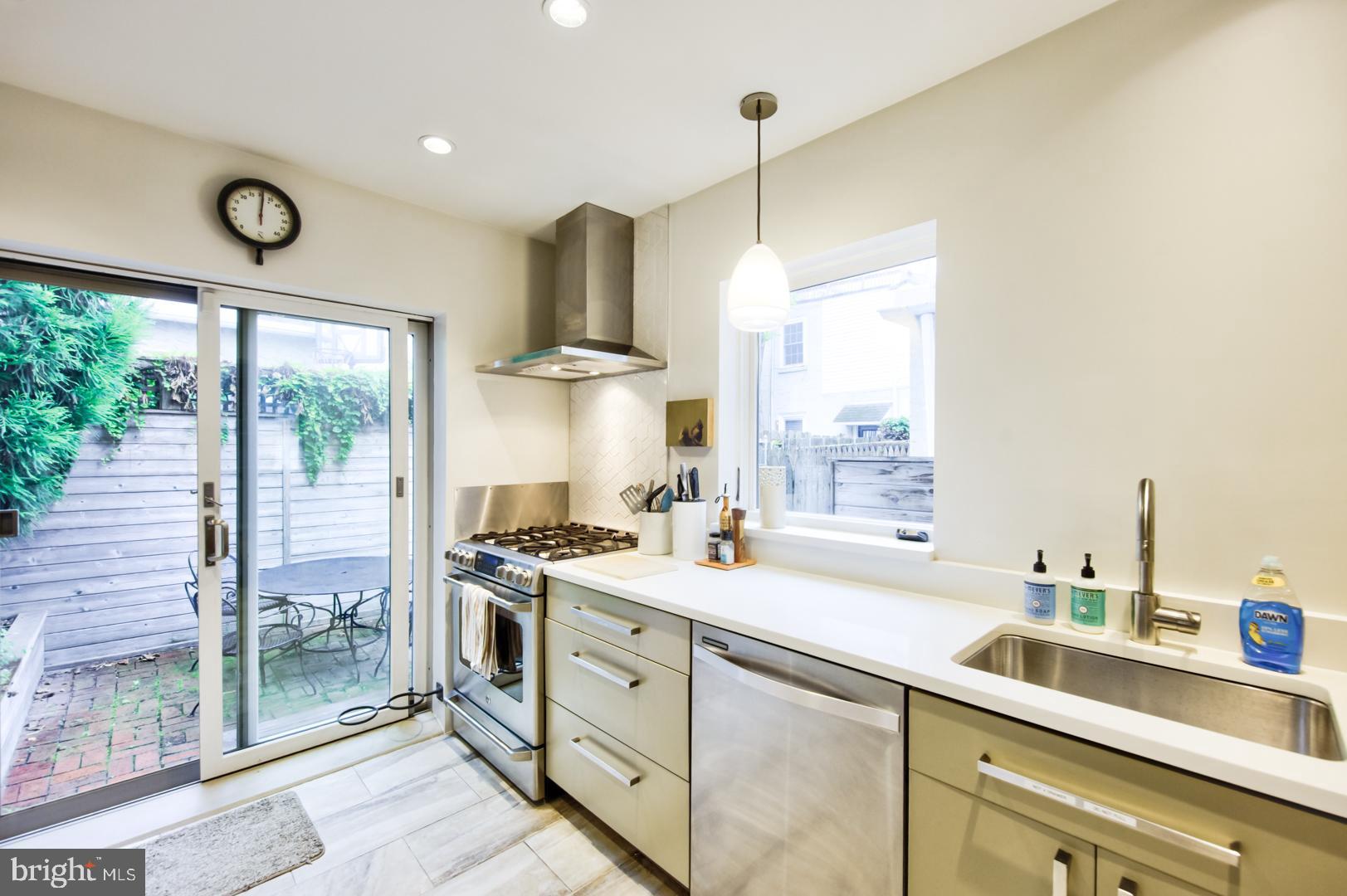 751 North Taylor Street Philadelphia, PA 19130 - Photo 6 of 21 a kitchen with a sink stove and cabinets