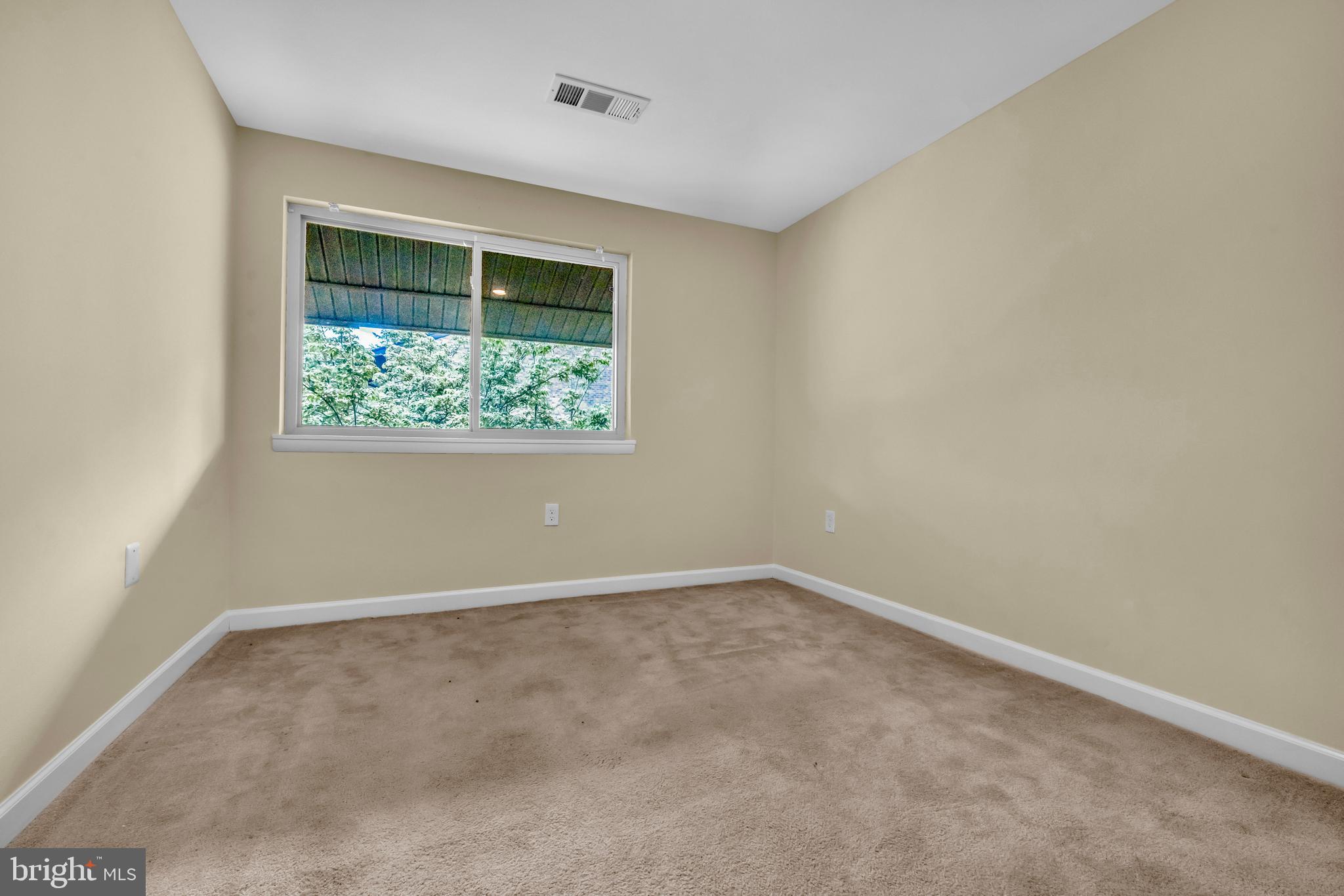 9920 Walker House Road, Unit 5 Gaithersburg, MD 20886 - Photo 17 of 24 an empty room with a window
