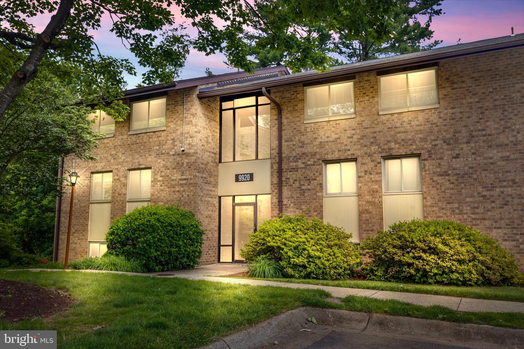 9920 Walker House Road, Unit 5 Gaithersburg, MD 20886 - Photo 23 of 24 a front view of a house having yard