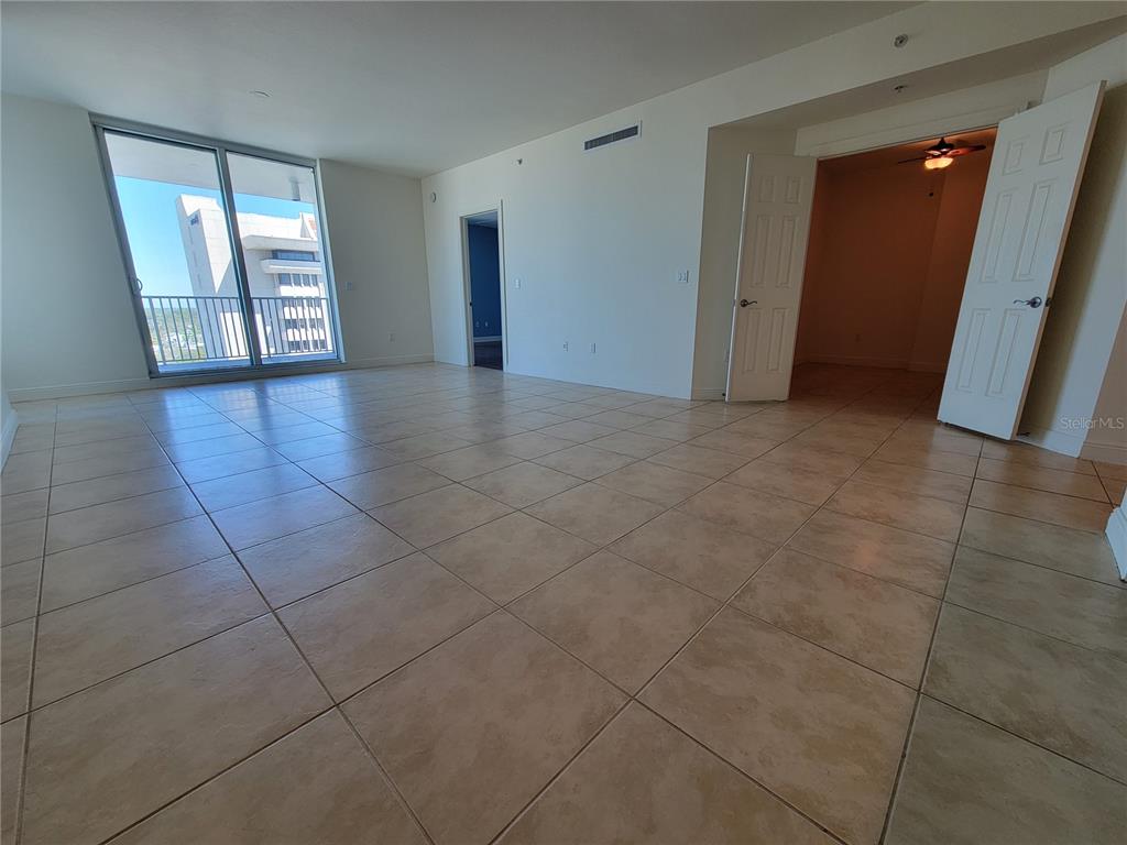 1771 Ringling Boulevard, Unit 902 Sarasota, FL 34236 - Photo 25 of 60 a view of an empty room and window in a room