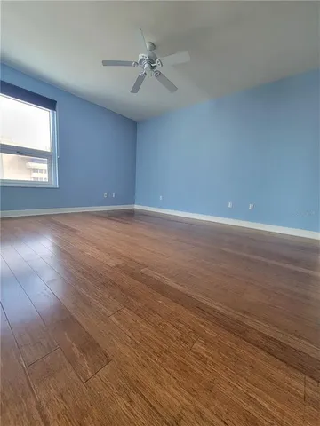 a spacious bathroom with a double vanity sink and a mirror