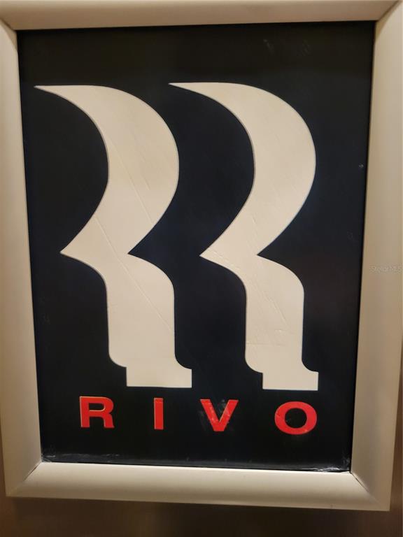 1771 Ringling Boulevard, Unit 902 Sarasota, FL 34236 - Photo 3 of 60 a close view of utility room with washer and dryer