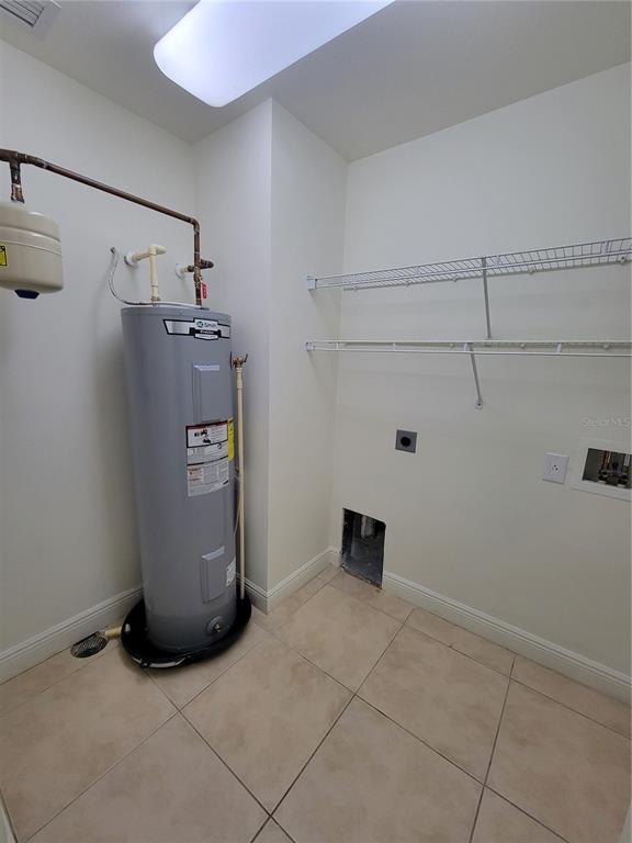 1771 Ringling Boulevard, Unit 902 Sarasota, FL 34236 - Photo 38 of 60 a view of a storage & utility room with racks on the wall