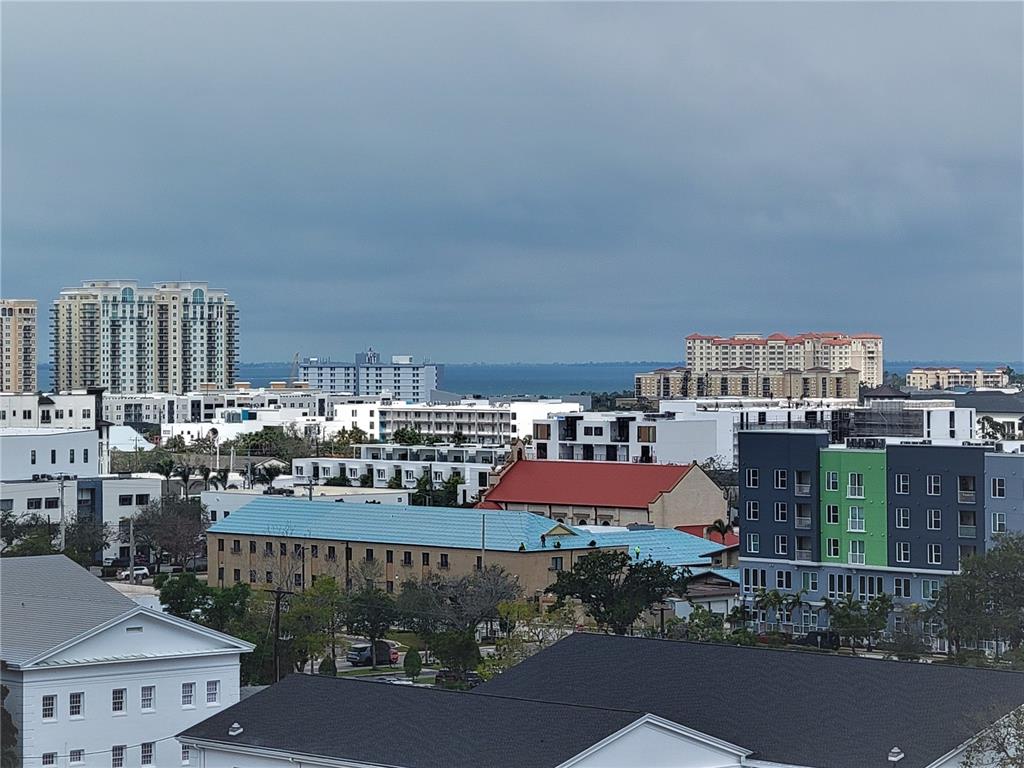 1771 Ringling Boulevard, Unit 902 Sarasota, FL 34236 - Photo 40 of 60 a view of a city from a balcony