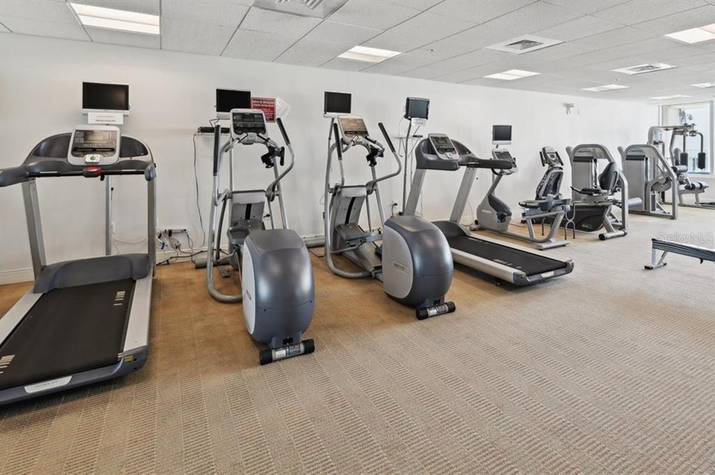 1771 Ringling Boulevard, Unit 902 Sarasota, FL 34236 - Photo 44 of 60 a view of a room with gym equipment