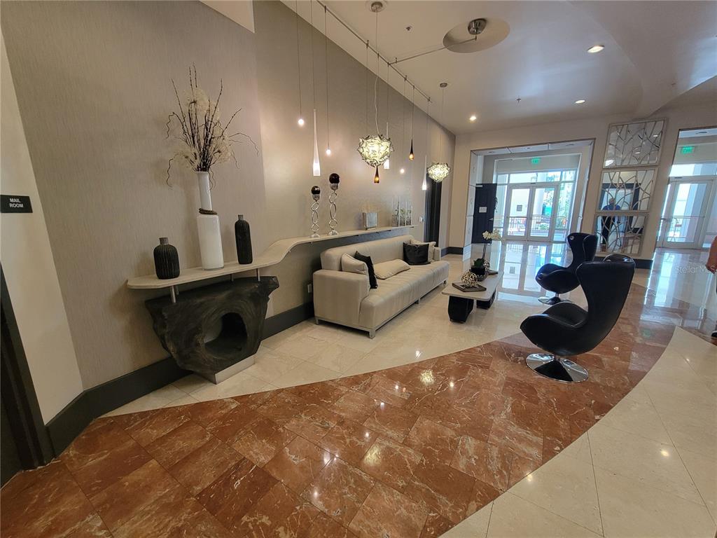 1771 Ringling Boulevard, Unit 902 Sarasota, FL 34236 - Photo 5 of 60 a living room with furniture