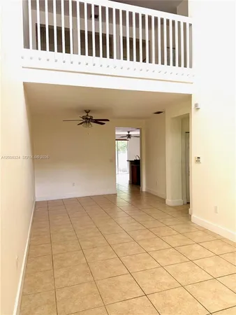 an entryway with a rug