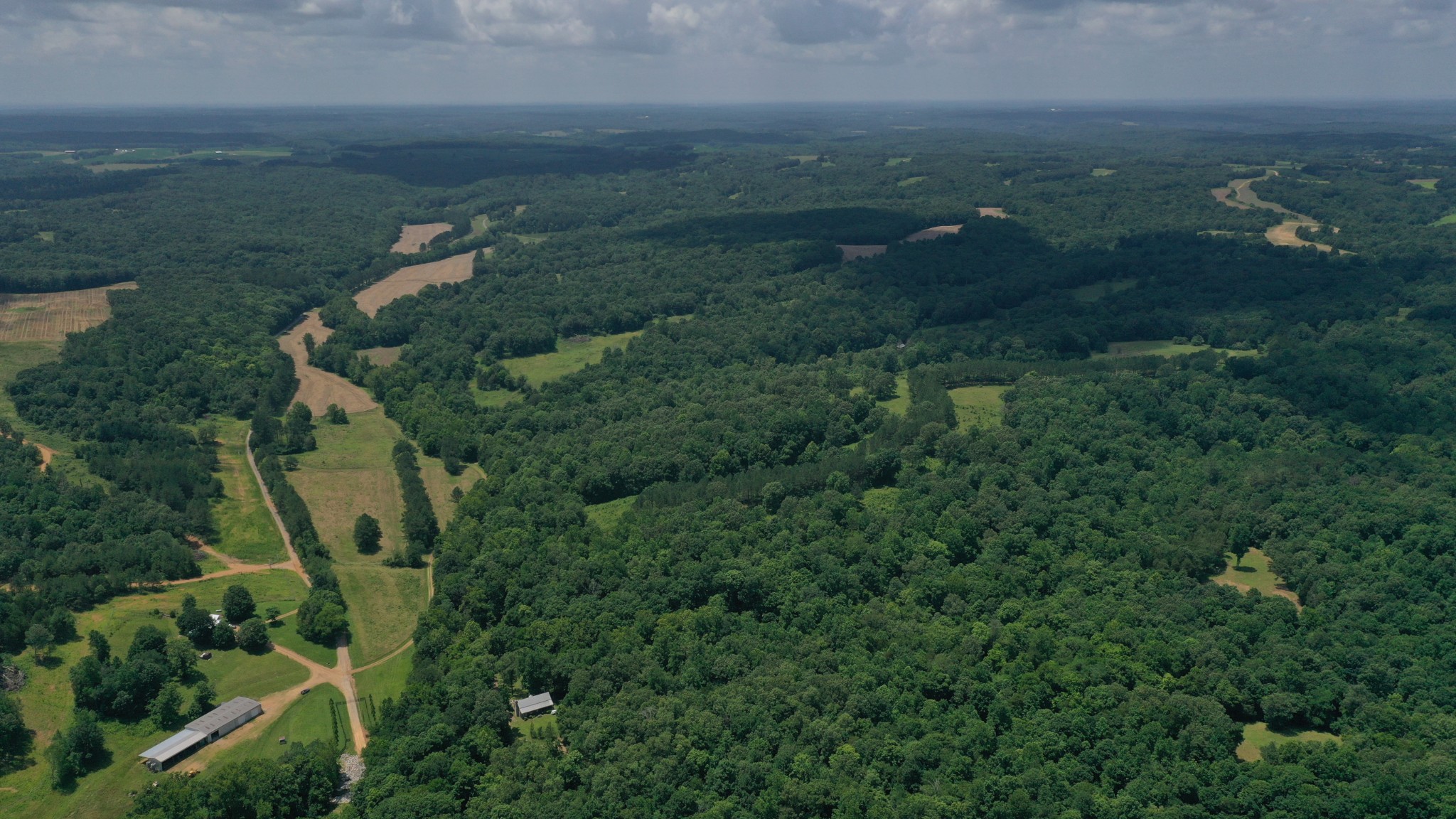 1092 Shoulder Strap Branch Road Vanleer, TN 37181 - Photo 12 of 14 an aerial view of residential house with outdoor space