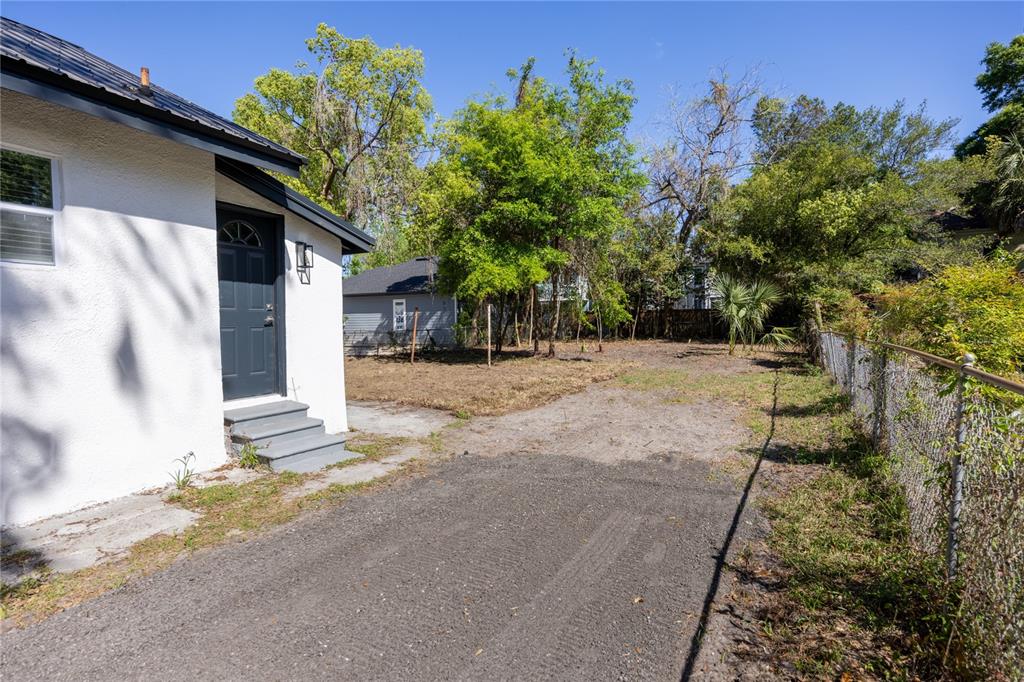 418 Northwest 3rd Avenue Gainesville, FL 32601 - Photo 26 of 31 a view of a house with a tree