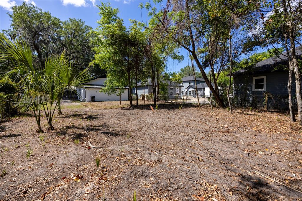 418 Northwest 3rd Avenue Gainesville, FL 32601 - Photo 29 of 31 a view of a house with a yard