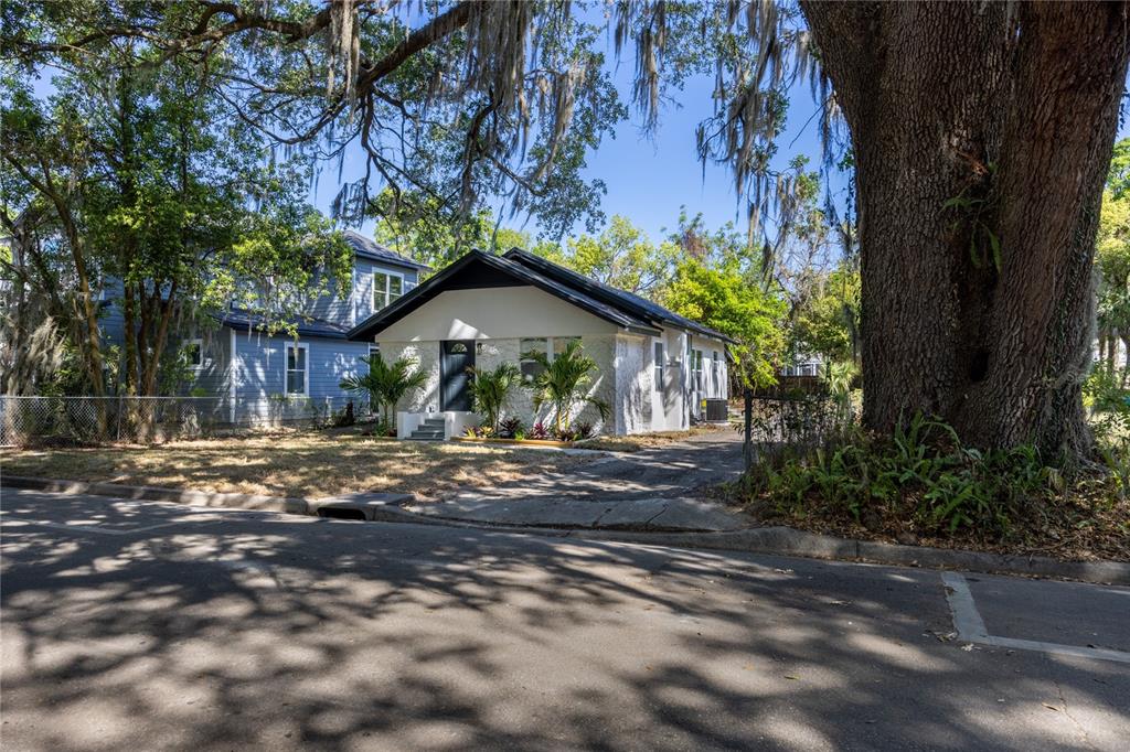 418 Northwest 3rd Avenue Gainesville, FL 32601 - Photo 3 of 31 a view of a house with a tree